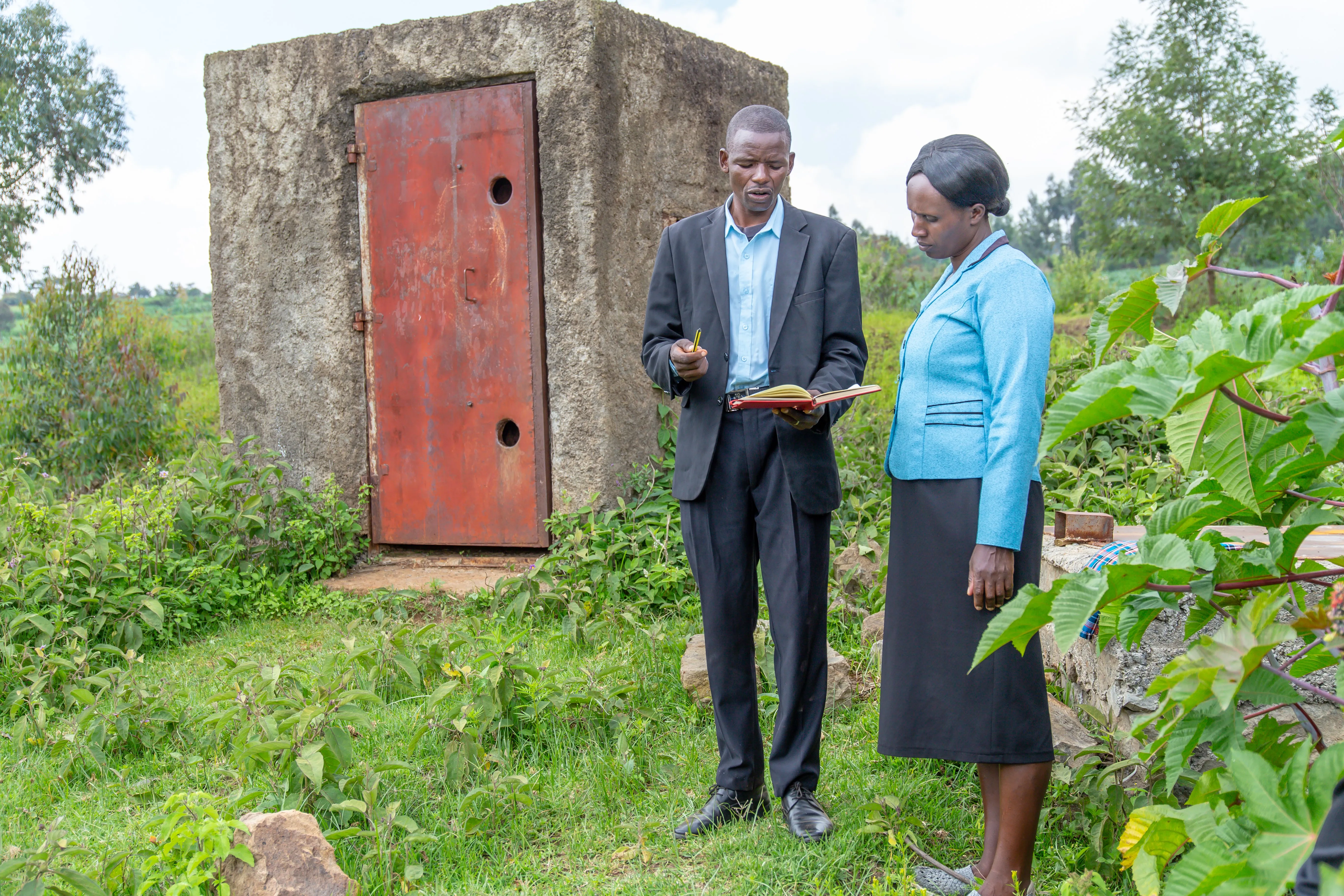 Rwamburi Water Project John and his wife